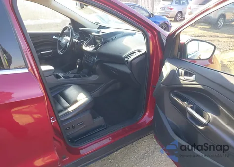 2017 Ford Escape Titanium z USA, uszkodzony, nr VIN 1FMCU9J93HUA07382